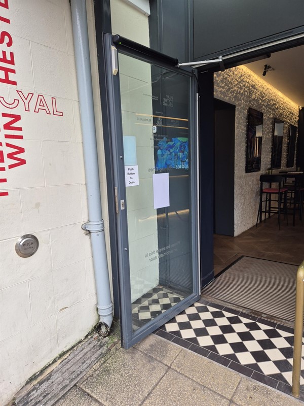 Entrance door with auto opener