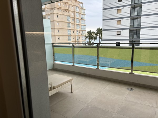 Balcony is south facing but looks out to back of an apartment block but it is ok actually. I would be happy there.