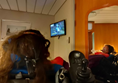 Image of a wheelchair user in watching a television