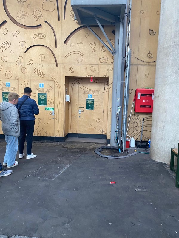Image of an accessible toilet door