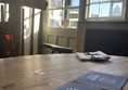 Image of twoo beer mats on a table
