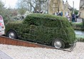 Privet hedge in the shape of a mini, outside the museum