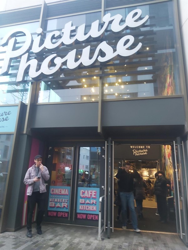 Image of a building with a sign on the front