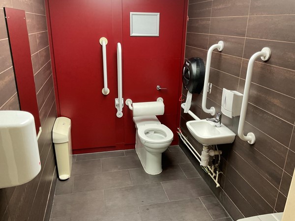 The accessible toilet is large enough to take scooters as well, nicely decorated without being fussy, with pull cord and grab rails.
