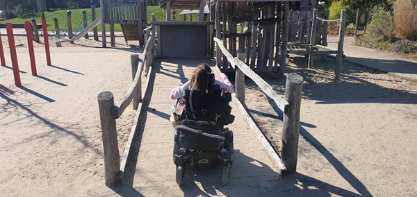 Picture of Claire going on to the wooden play area