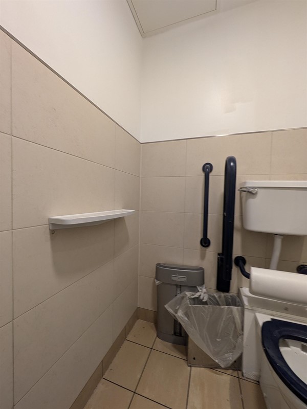 image of colostomy shelf in the right accessible bathroom on the first floor