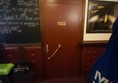 Image of an accessible toilet door.