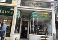 Image of the entrance to the shop, showing the step.