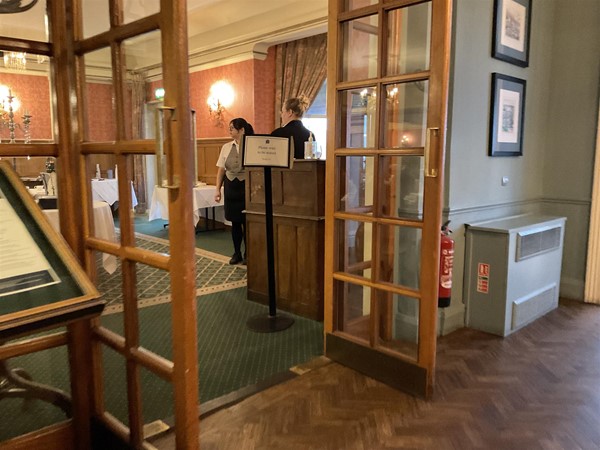Image of double doors leading into a restaurant