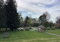 Picture of a lawn with a picnic bench