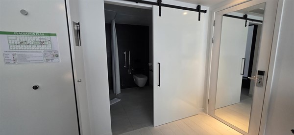 Bathroom and exit door from the bed