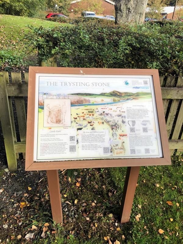 A sign with information on the trysting stone