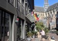 The hotel exterior with the Grote Kerk of St Bavo