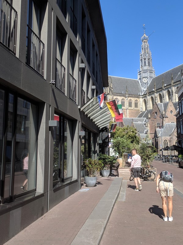 The hotel exterior with the Grote Kerk of St Bavo
