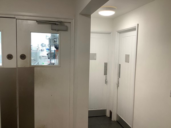 Picture of some white toilet doors
