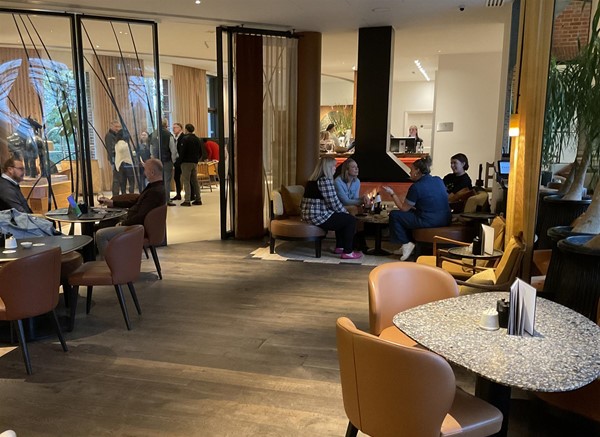 Image of people sitting at tables