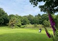 The grass slope to the first lake