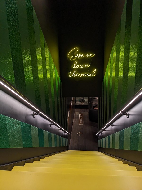 The Wiz have a fun and interactive photo opportunity recreating the yellow brick road... down a flight of stairs. The level access routes are very industrial and not themed.