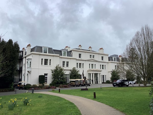 If your carer is fit enough and willing, why not pull into the main car park which is over to the LEFT of the main house, and follow the curved path that leads towards the Mansion