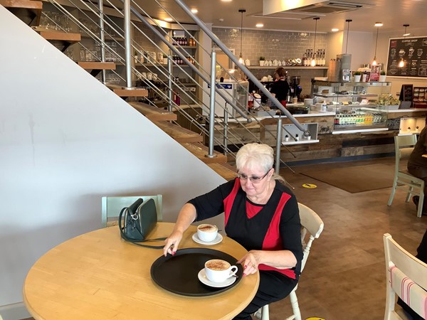 Image for review "Disabled traveler visiting top class farm shop"