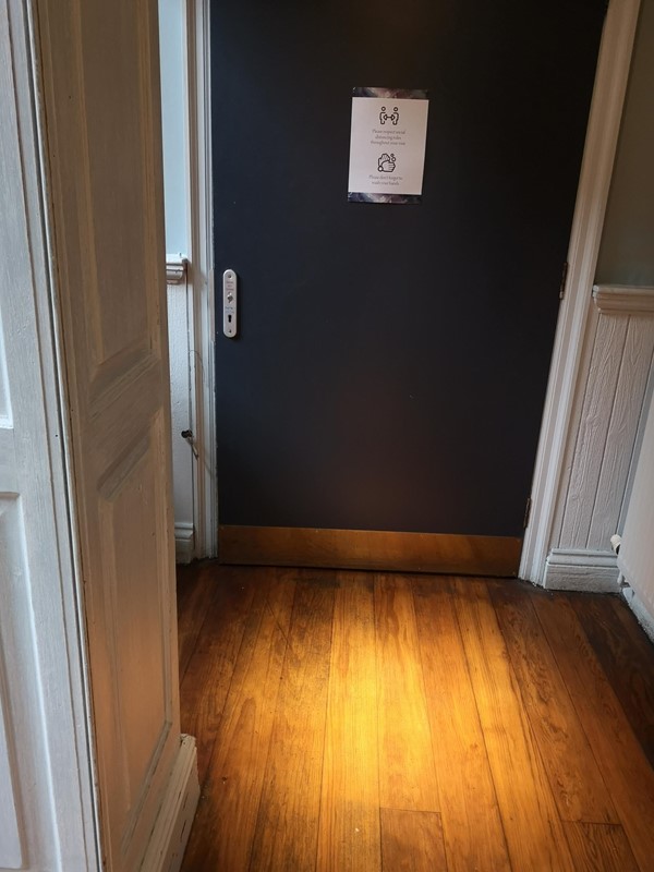 Accessible toilet with radar key and poster