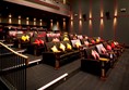 Picture of the sofas and the steps in the cinema
