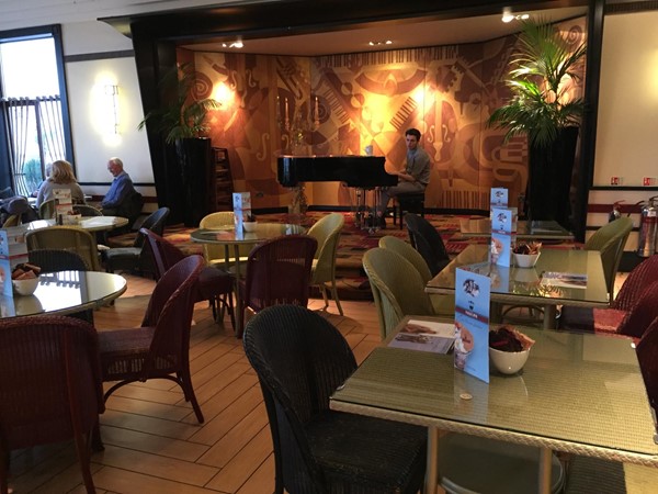 Piano player and interior of restaurant