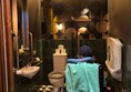 Image of a person in an accessible toilet