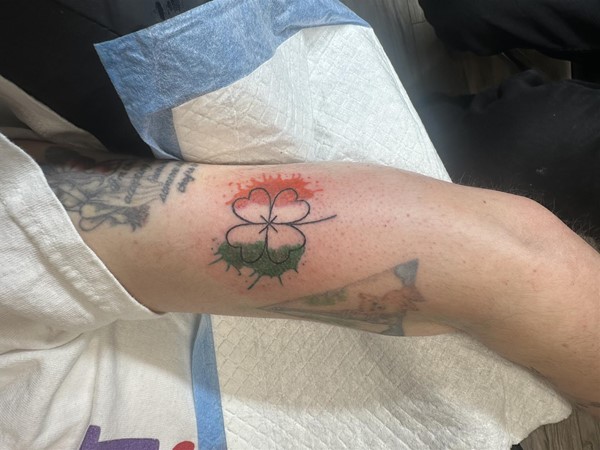 Four leaf clover tattoo with Irish flag colours watercolour splash