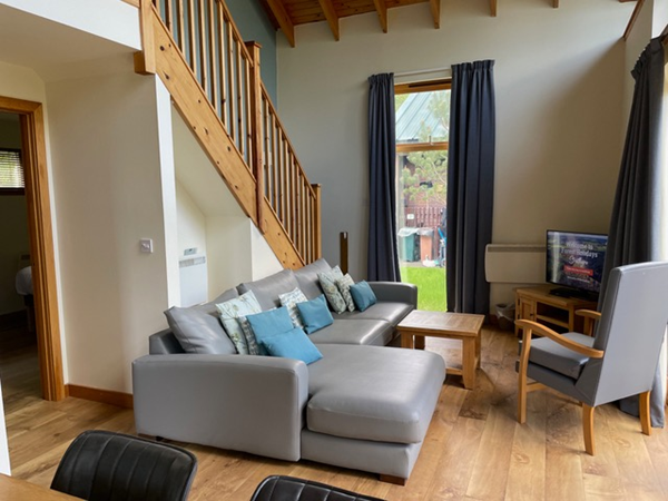 Interior of a Forest Holidays, Strathyre lodge.  Sitting area with TV