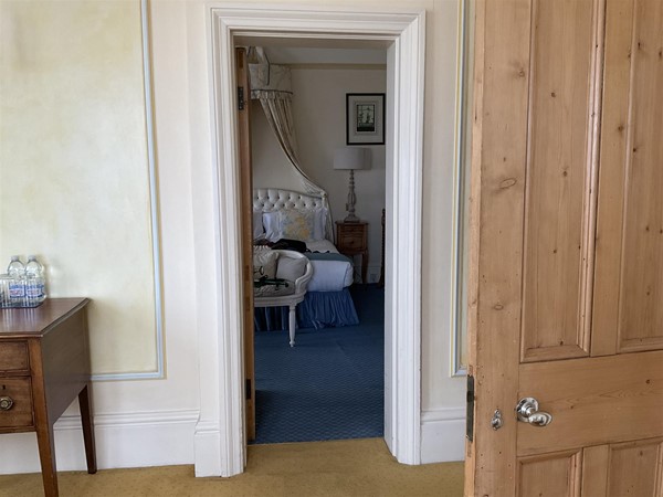 Image of a door leading to a bedroom