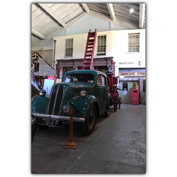 Vintage car and fire truck