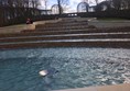 water fall feature in centre of gardens.