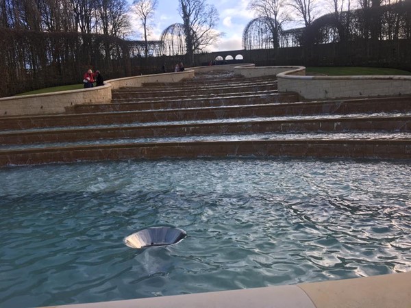 water fall feature in centre of gardens.