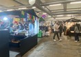 Image of people and stalls