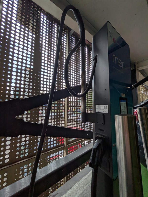 image of mer electric vehicle charging point with integrated cable from the side