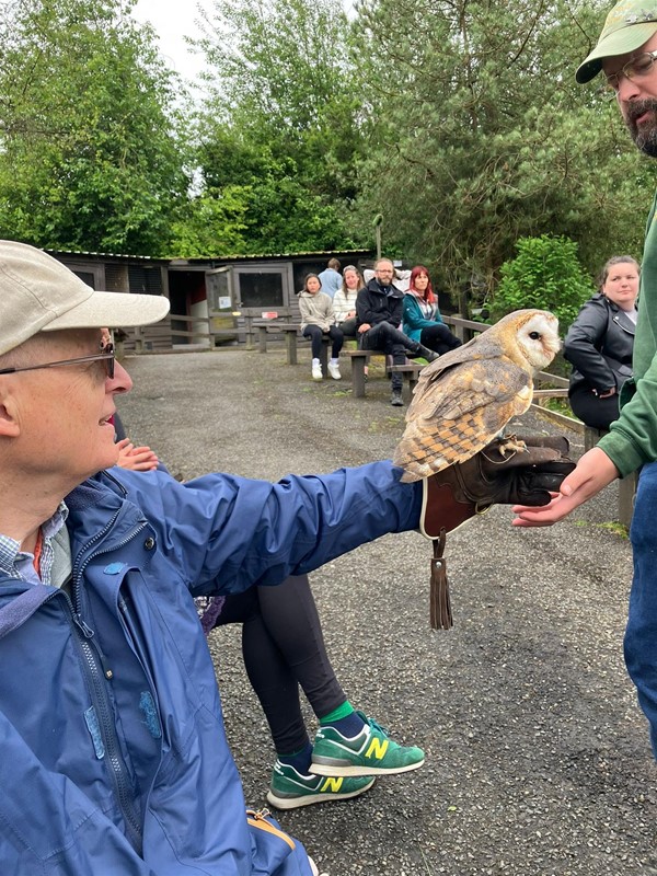 Image of a person with an owl