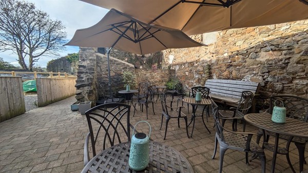 Dog friendly seating area to the rear.