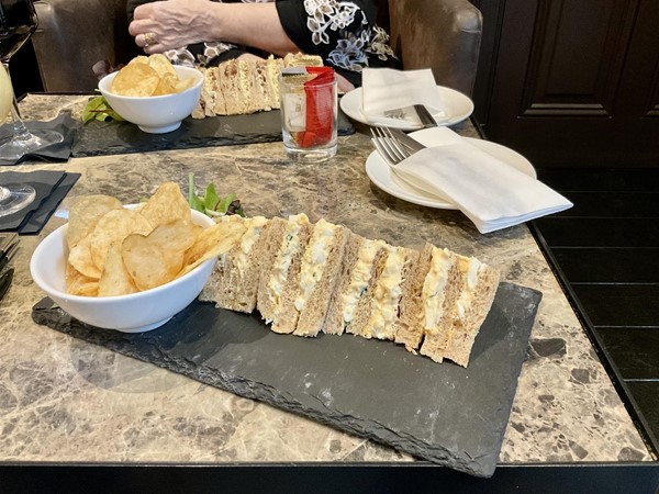 Image of sandwiches and crisps.