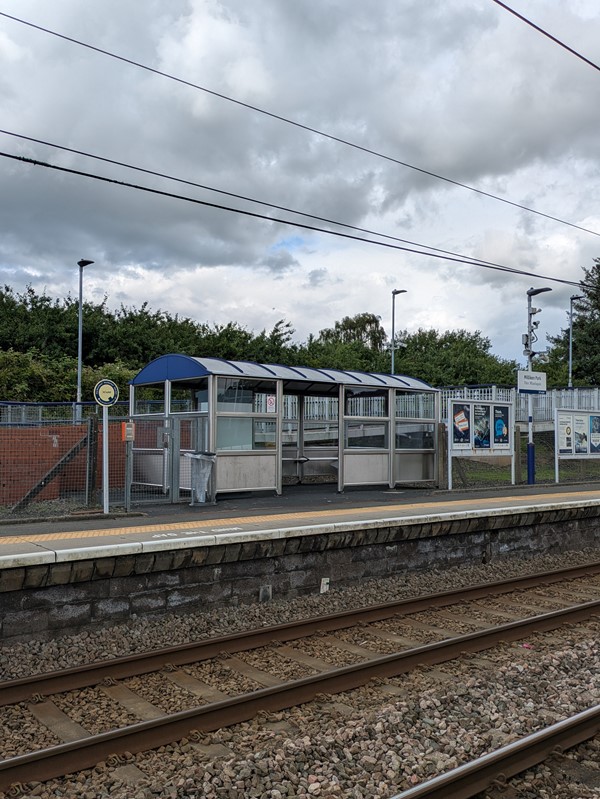 Image of rain shelter from across the platform