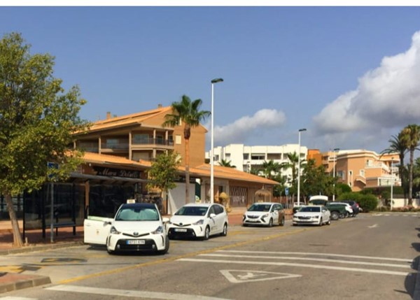 Taxis- some specially adapted to enter through the rear.