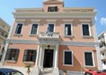 Entrance to hotel, handrail on right