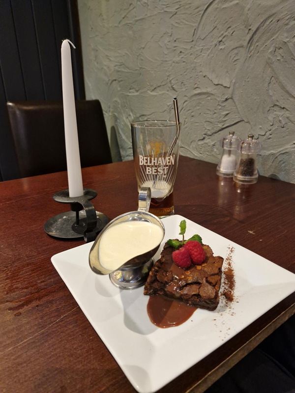 Tripple chocolate brownie with cream. A really wonderful finish to the meal!