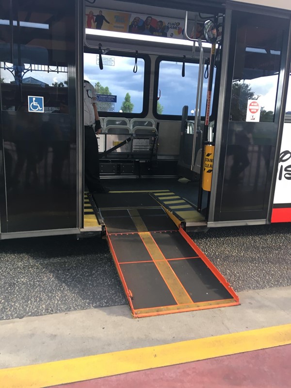 The electronic ramp on the bus.