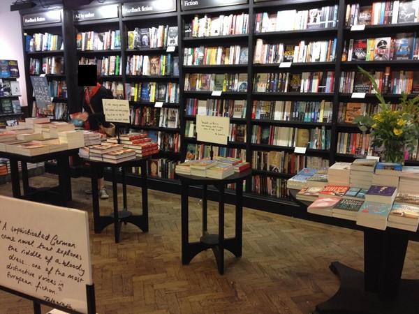 Tables blocking access to bookshelves
