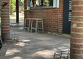Image of small kiosk with stools