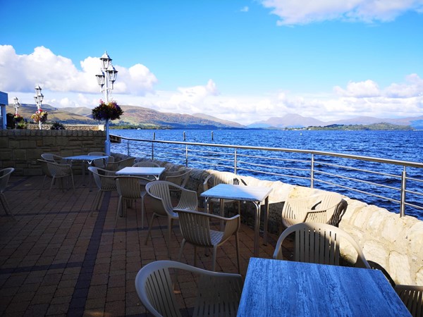 Outdoor seating overlooking the loch