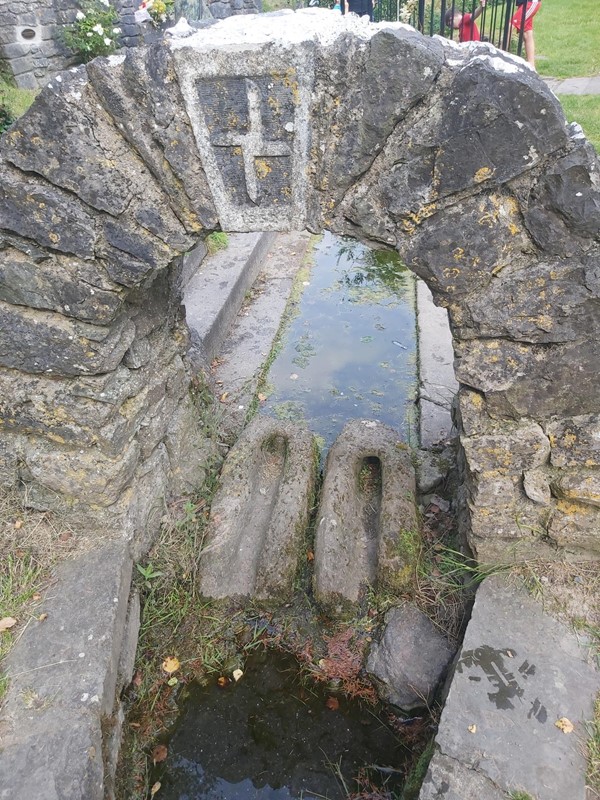 image of water travelling down a stone gully