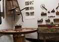 Exhibit inside the museum on a slightly raised plinth that keeps the walkway free.