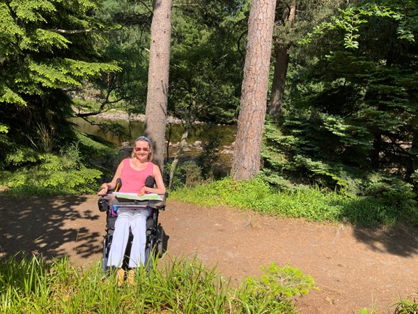 Wheelchair user in the woods